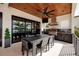 Well-equipped outdoor kitchen and dining area, perfect for entertaining with modern appliances at 389 Bayview Ne Dr, St Petersburg, FL 33704