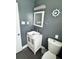 Charming powder room with a vanity, vessel sink, and decorative accents, creating a welcoming and functional space at 428 45Th N Ave, St Petersburg, FL 33703