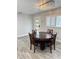 Dining room features new hardwood flooring and a modern light fixture at 428 45Th N Ave, St Petersburg, FL 33703