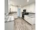 Bright modern kitchen with stainless steel appliances and sleek countertops at 428 45Th N Ave, St Petersburg, FL 33703
