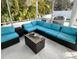 Enjoy the cozy screened-in lanai with comfortable seating and an outdoor kitchen at 428 45Th N Ave, St Petersburg, FL 33703