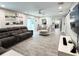 Bright living room with wood flooring, a sectional sofa, and stylish decor at 428 45Th N Ave, St Petersburg, FL 33703