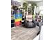 Cozy office space with organized bookshelves, a comfortable chair, and ample plants at 428 45Th N Ave, St Petersburg, FL 33703
