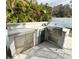 Outdoor kitchen features stainless steel appliances and counter space at 428 45Th N Ave, St Petersburg, FL 33703
