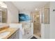 Bathroom featuring a glass shower, a bathtub, granite countertops, and modern fixtures at 515 Leffingwell Ave # 211, Ellenton, FL 34222