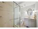 Clean bathroom with a glass enclosed shower and vanity at 515 Leffingwell Ave # 211, Ellenton, FL 34222