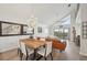 Open concept layout showcases dining area, living room and outside views at 515 Leffingwell Ave # 211, Ellenton, FL 34222