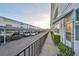 Building exterior view showing parking, sidewalk and lush landscaping near the entrance at 5155 9Th N Ave # 102, St Petersburg, FL 33710