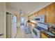 Functional kitchen features updated appliances, countertops, and ample storage for culinary enthusiasts and cooking at 5155 9Th N Ave # 102, St Petersburg, FL 33710