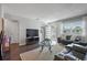 Bright living room featuring wood floors, modern furniture, and access to a patio at 5246 81 N St # 24, St Petersburg, FL 33709