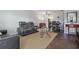 Inviting living room with modern furniture, dark wood floors, and a ceiling fan at 5246 81 N St # 24, St Petersburg, FL 33709