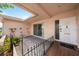 Cozy outdoor patio area with a sliding glass door, offering a private retreat at 5428 Larchmont N Ct # 5428, Pinellas Park, FL 33782