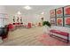 Spacious living room with unique decor and ample natural light at 559 Scotland St, Dunedin, FL 34698