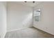 Bedroom with neutral carpet, ceiling fan, and bright window at 5619 Tranquil Pond Pl, Riverview, FL 33578