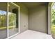 The patio overlooks a lush pond, offering a tranquil retreat just steps from indoors at 5619 Tranquil Pond Pl, Riverview, FL 33578