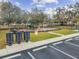 Aerial view of community playground near parking and mailboxes, creating convenient opportunities for recreation and neighborly connection at 5619 Tranquil Pond Pl, Riverview, FL 33578