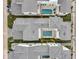 Aerial view showcasing new homes with landscaped backyards featuring pools and modern design elements at 6023 Cat Claw Ln, Bradenton, FL 34210