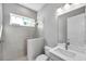 Bathroom with tiled walk-in shower, modern fixtures, and sleek vanity at 6023 Cat Claw Ln, Bradenton, FL 34210