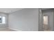 Bedroom featuring neutral paint, tile flooring, and an attached bathroom at 6023 Cat Claw Ln, Bradenton, FL 34210