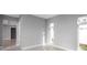 Bright bedroom with modern fixtures, tile floors and plenty of natural light at 6023 Cat Claw Ln, Bradenton, FL 34210