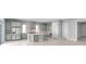 Open floor plan kitchen with gray cabinetry, stainless steel appliances, and tile flooring at 6023 Cat Claw Ln, Bradenton, FL 34210