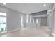 Bright living room with expansive windows for natural light and scenic outdoor views at 6023 Cat Claw Ln, Bradenton, FL 34210