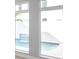 View of pool and water feature from windows of living room at 6023 Cat Claw Ln, Bradenton, FL 34210