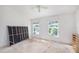 Bright bedroom with two windows and a ceiling fan at 6236 Olivedale Dr, Riverview, FL 33578