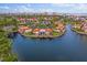 Stunning aerial view of waterfront condominiums with lush landscaping and boat docks at 6277 Bahia Del Mar Blvd # 110, St Petersburg, FL 33715