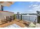 Relaxing outdoor seating area on a private balcony with peaceful water views at 6277 Bahia Del Mar Blvd # 110, St Petersburg, FL 33715