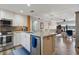 Modern kitchen with stainless steel appliances, granite countertops, and an open layout at 6277 Bahia Del Mar Blvd # 110, St Petersburg, FL 33715