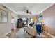 Living room featuring a ceiling fan, balcony access, and comfortable decor at 6277 Bahia Del Mar Blvd # 110, St Petersburg, FL 33715
