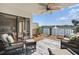 Outdoor patio with furniture, ceiling fan and a waterfront view at 6277 Bahia Del Mar Blvd # 110, St Petersburg, FL 33715