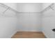 Walk-in closet with wire shelving and hardwood floors at 803 W Woodlawn Ave, Tampa, FL 33603