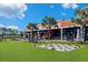 Outdoor game area with large chessboard and checkerboard outside of Armature Works at 803 W Woodlawn Ave, Tampa, FL 33603