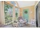 Relaxing balcony with comfortable chair and serene forest view, perfect for unwinding at 9481 Highland Oak Dr # 1616, Tampa, FL 33647