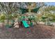 Community playground with slides, climbing structures, and shaded seating areas for enjoyment at 9481 Highland Oak Dr # 1616, Tampa, FL 33647