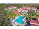 Stunning aerial view of community pool surrounded by lush greenery, offering a refreshing escape at 9481 Highland Oak Dr # 1616, Tampa, FL 33647