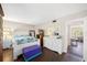 This bedroom has wood floors, lots of furniture, and a nice mirror at 1000 79Th N Ave # 211, St Petersburg, FL 33702