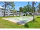 Outdoor recreation area with shuffleboard and manicured lawns at 1000 79Th N Ave # 211, St Petersburg, FL 33702