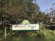 Fossil Park sign for the City of St. Petersburg, surrounded by lush trees and greenery at 1000 79Th N Ave # 211, St Petersburg, FL 33702