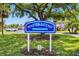A Winston-Gateway Condominiums sign surrounded by lush greenery and mature trees at 1000 79Th N Ave # 211, St Petersburg, FL 33702