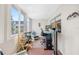 This sun room has great light, plants, and a place to work at 1000 79Th N Ave # 211, St Petersburg, FL 33702