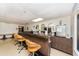 Features an entertaining wet bar complete with barstools, mirrored accents, and beverage refrigeration at 10035 63Rd N Ave # 23, St Petersburg, FL 33708
