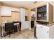 Bonus room featuring a built-in wine fridge, desk, and access to the kitchen at 10035 63Rd N Ave # 23, St Petersburg, FL 33708