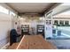 Community grill area with two grills, a picnic table, and ample space for outdoor cooking and socializing at 10035 63Rd N Ave # 23, St Petersburg, FL 33708