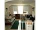 Cozy living room features a rocking chair, futon, and bright natural light at 1107 S Prospect Ave, Clearwater, FL 33756