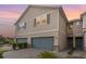 Charming townhome features a two-car garage, neutral colors and decorative shutters at 11638 Woodleaf Dr, Bradenton, FL 34211
