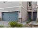 The exterior features a well-maintained lawn and an attached two-car garage at 11638 Woodleaf Dr, Bradenton, FL 34211