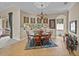 Cozy dining room with classic wooden furniture and bright natural light at 13538 Thoroughbred Dr, Dade City, FL 33525